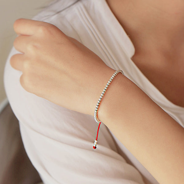 XSpiritual™-  "Lu" prosperity bracelet made of silver and red rope from Tibet